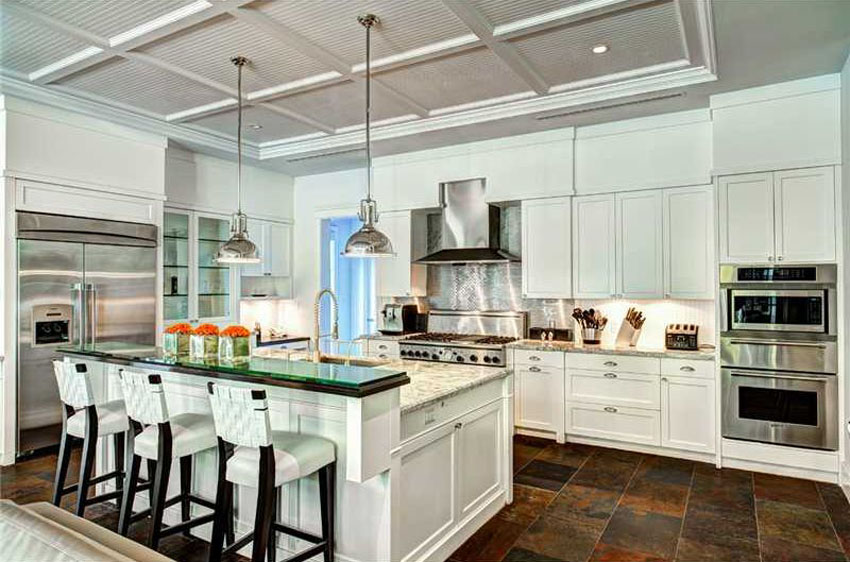 open kitchen with island and breakfast bar